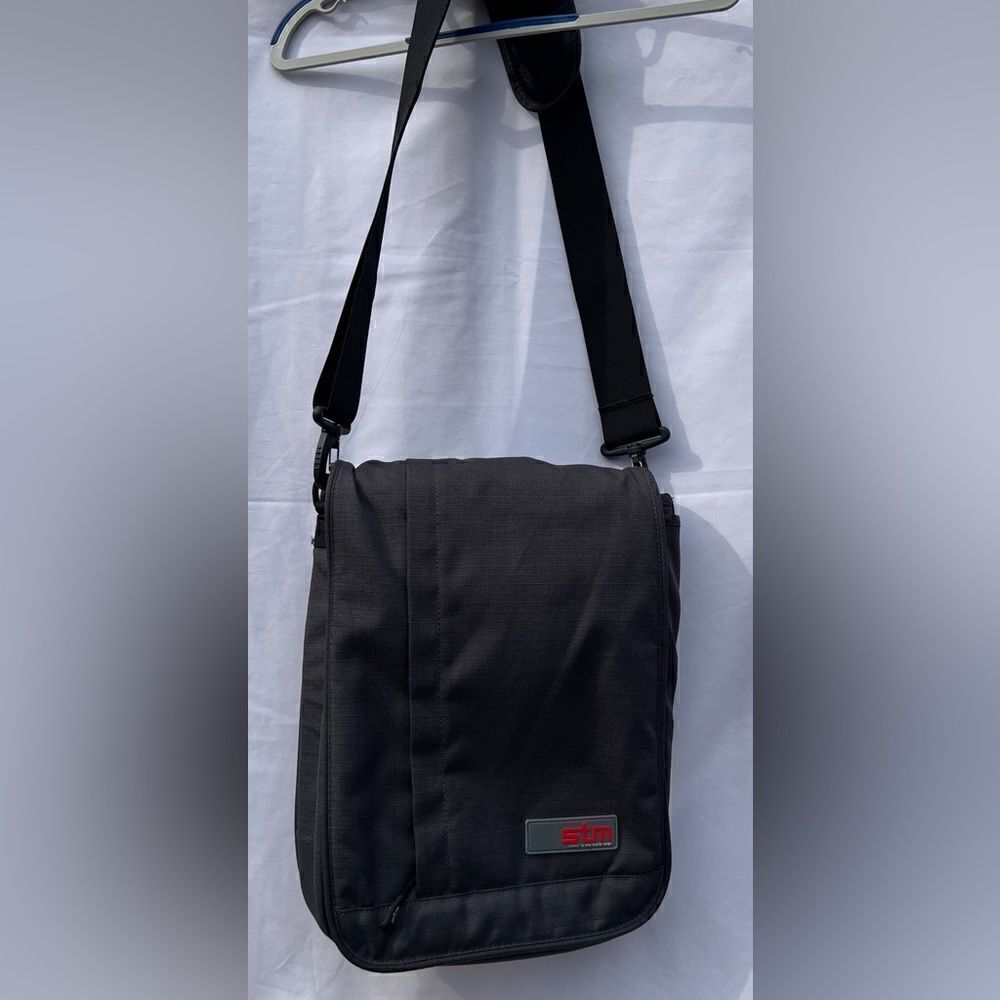 NWOT. STM IPad case. Grey in color.